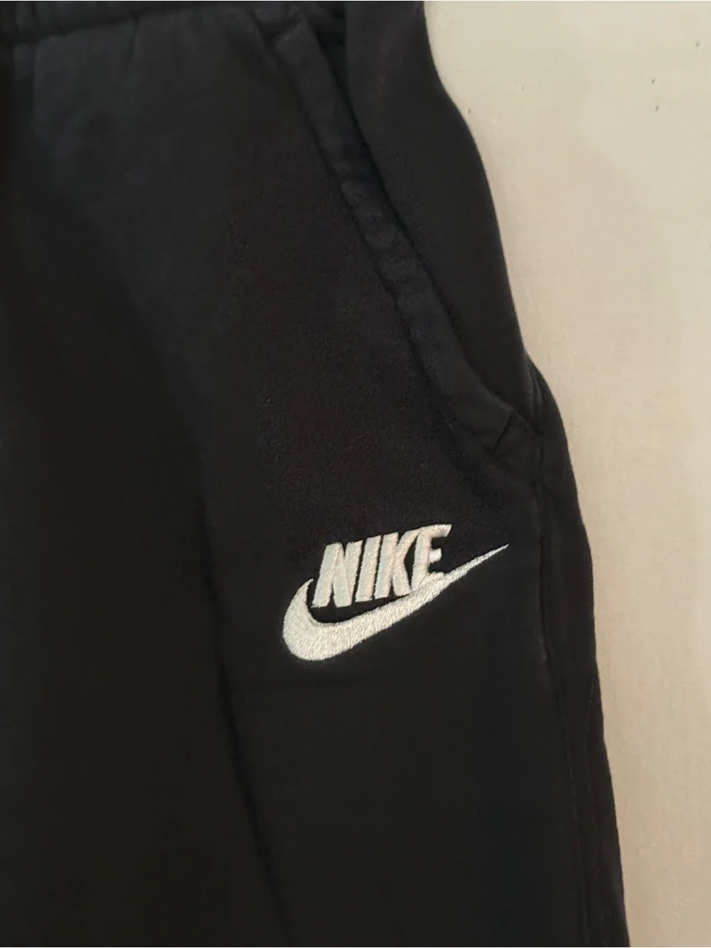 Nike Black Youth Jogger Pants with White Swoosh